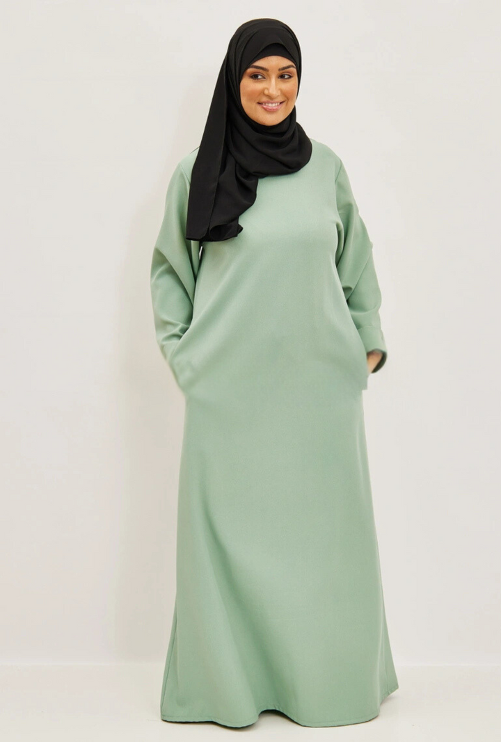 Abaya opgerolde mouwen