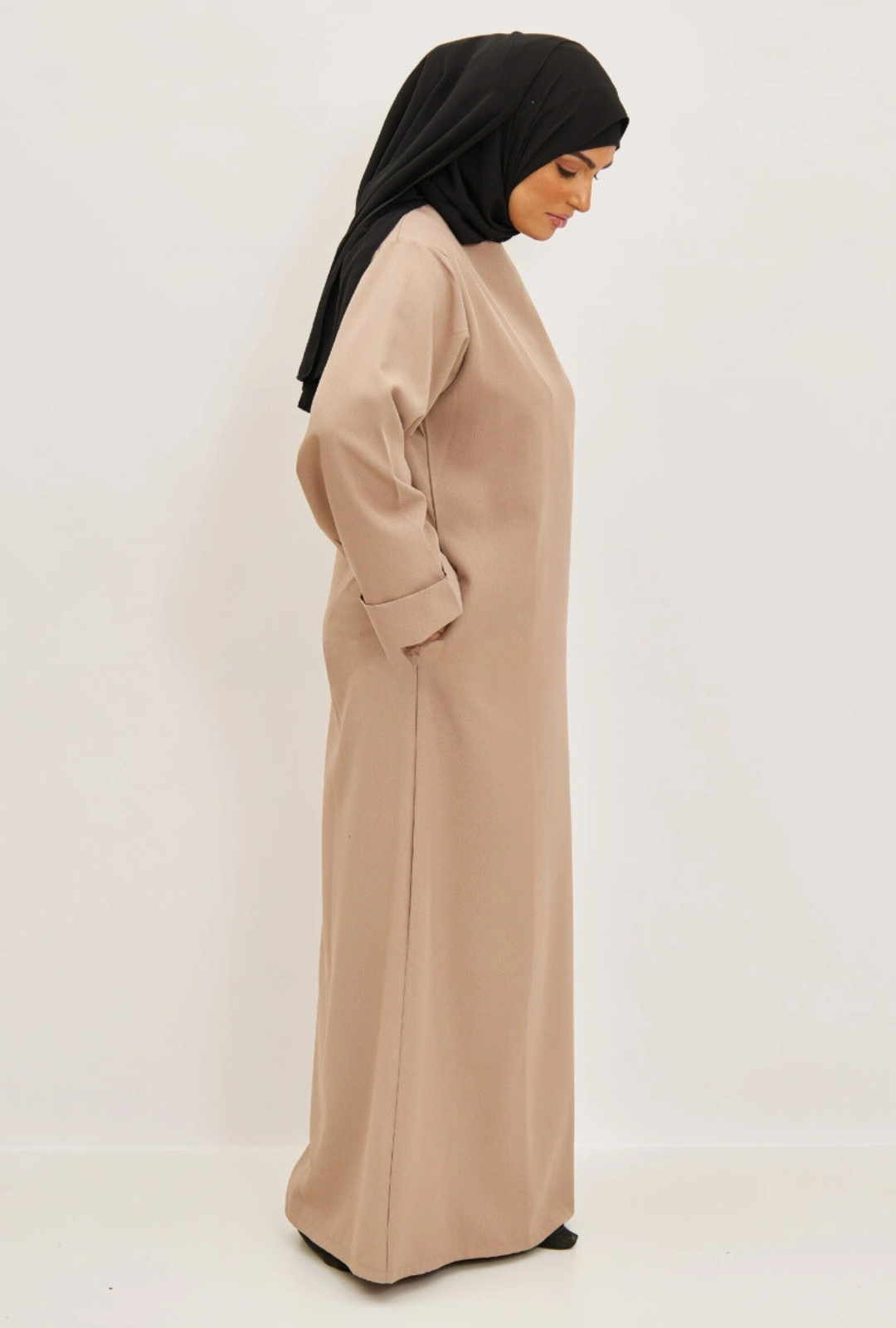 Abaya opgerolde mouwen