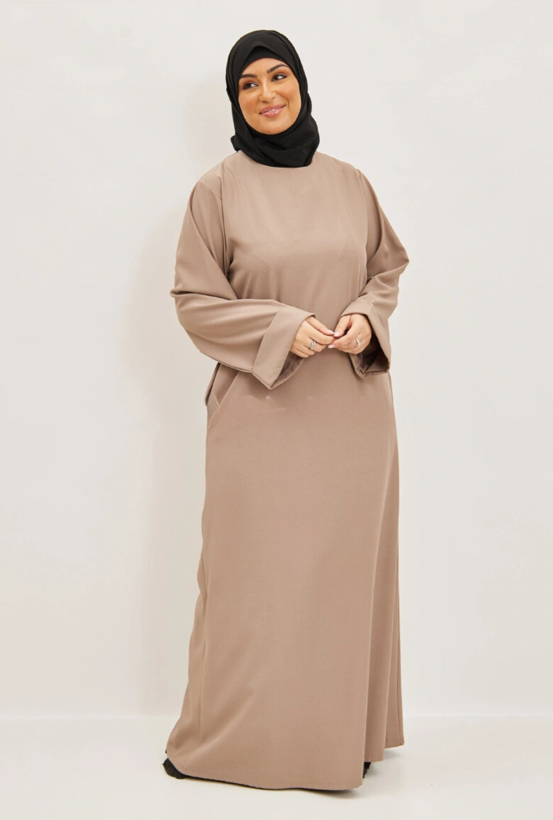 Abaya opgerolde mouwen