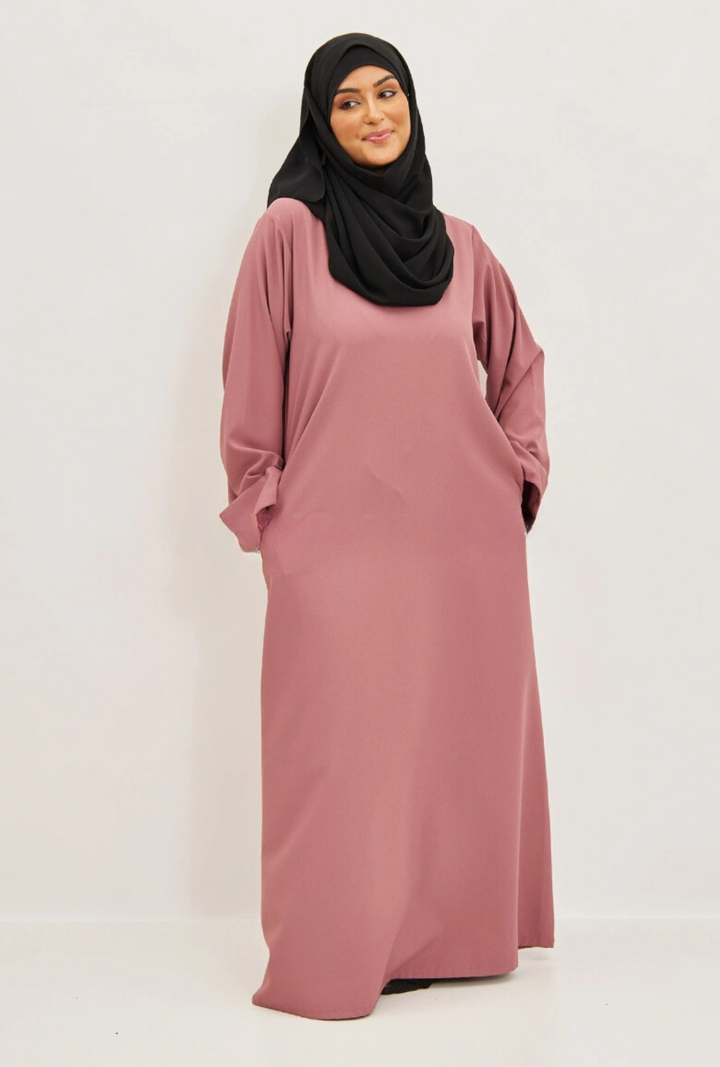 Abaya opgerolde mouwen