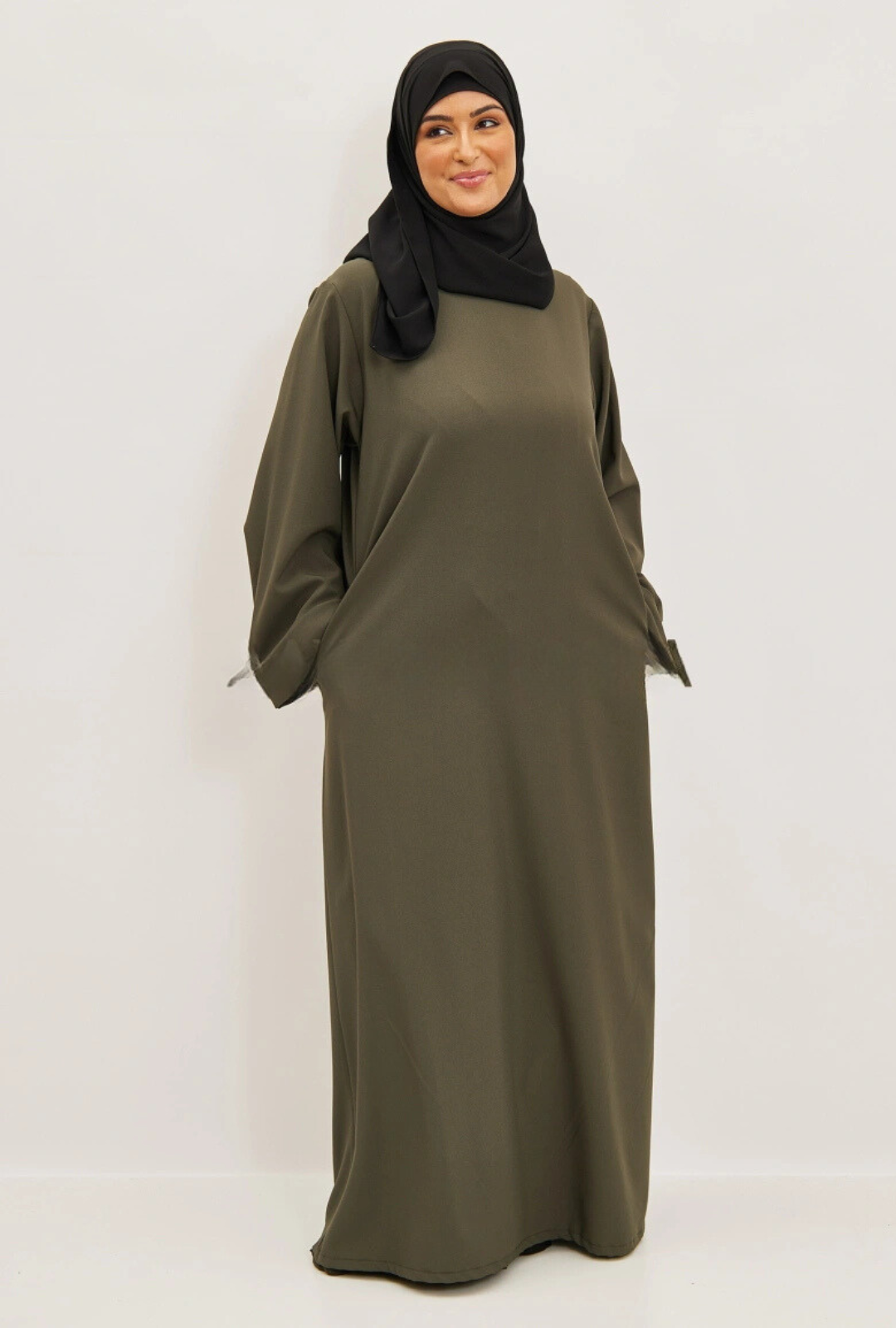 Abaya opgerolde mouwen