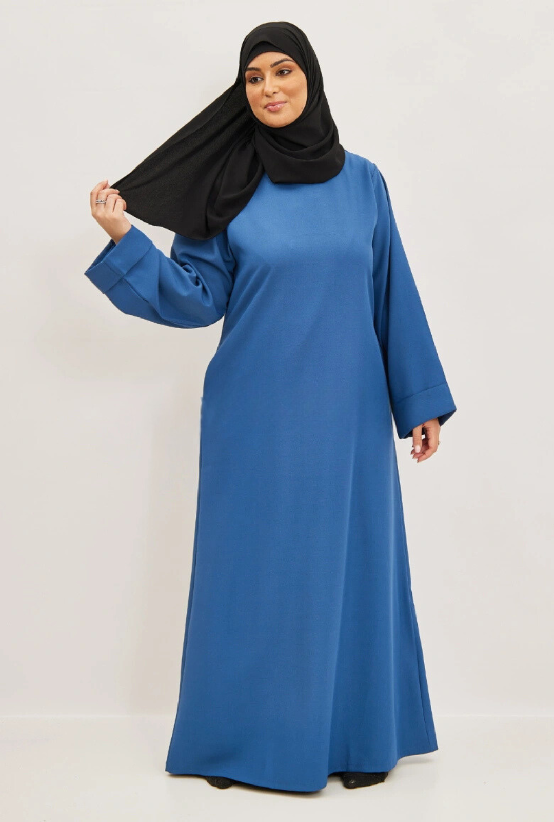 Abaya opgerolde mouwen