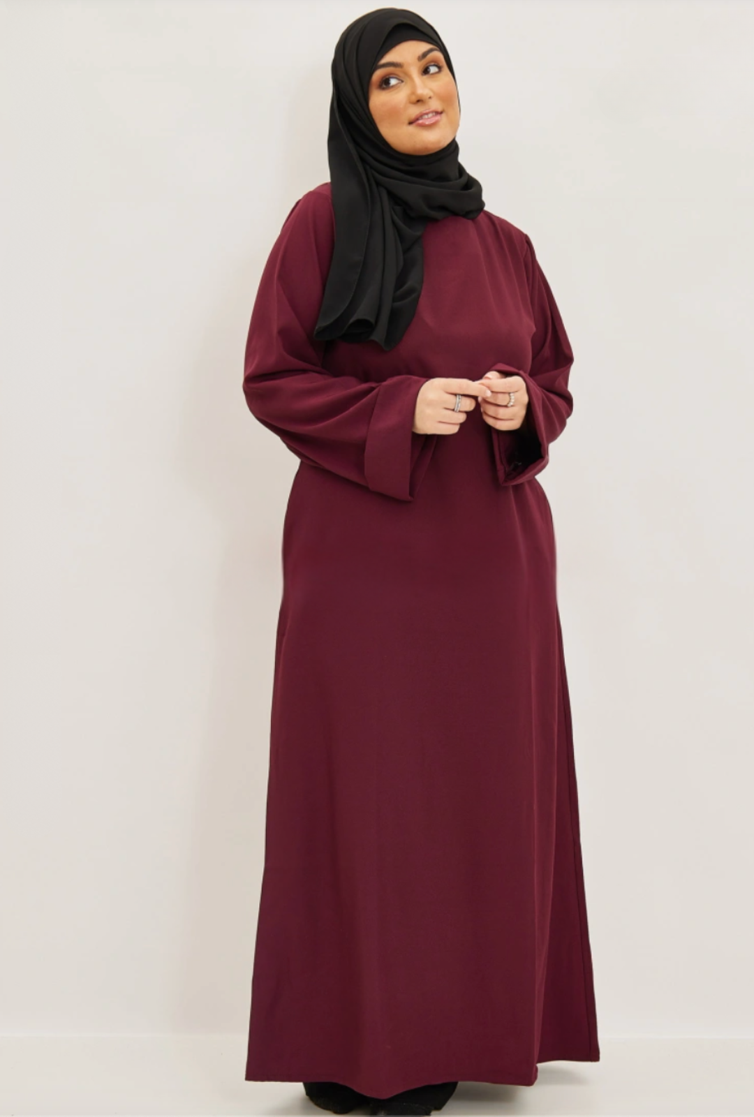 Abaya opgerolde mouwen